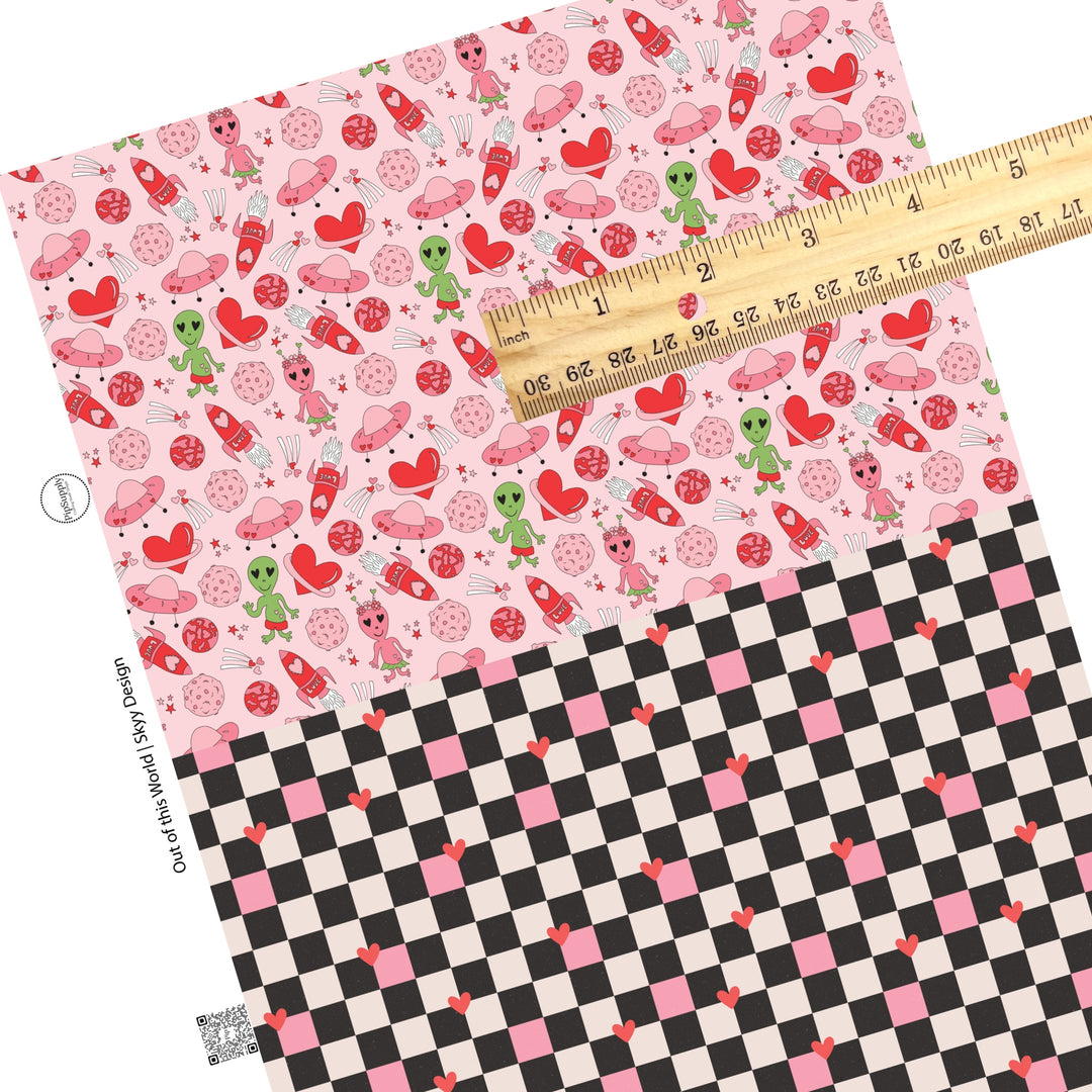 Green and pink aliens with red heart planet and pink spaceships and black and white checker with pink accents faux leather sheet