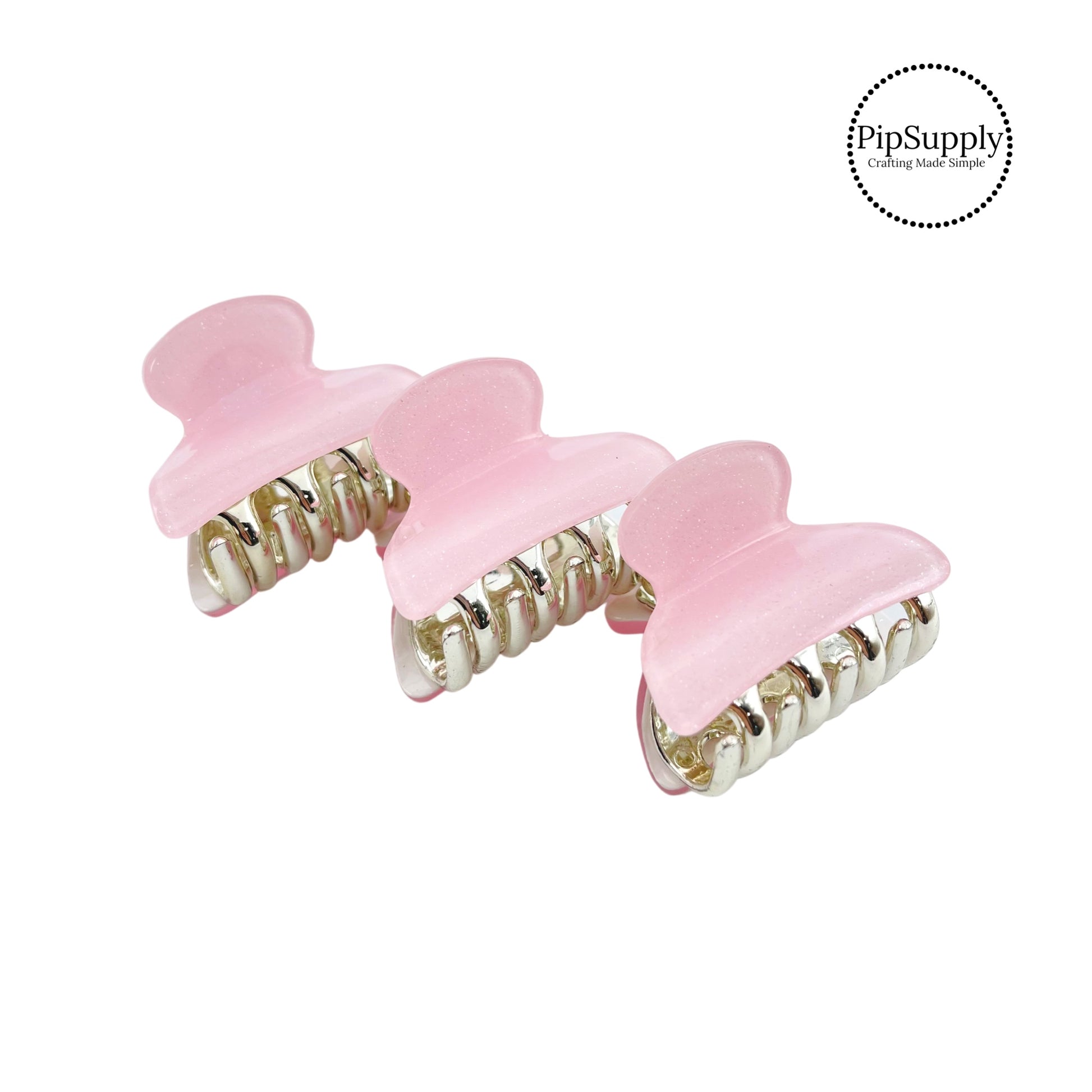 Baby pink shimmer resin claw hair clips