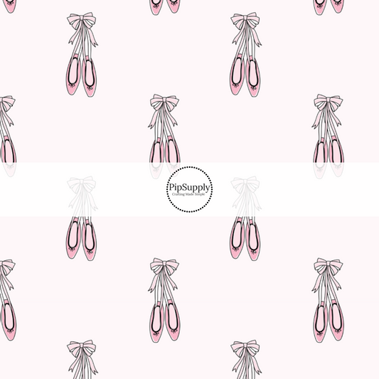 light pink fabric by the yard with hanging pink pointe ballet shoes - Ballerina Fabric