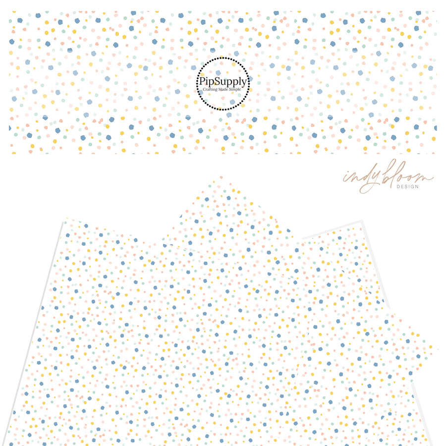 Pink, blue, yellow, mint green confetti dot pattern on a faux leather sheet.