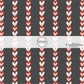 Black fabric by the yard with red and pink vertical hearts