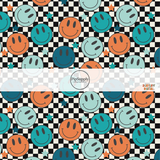 Orange and blue smiley faces and stars on black and white checkered fabric by the yard