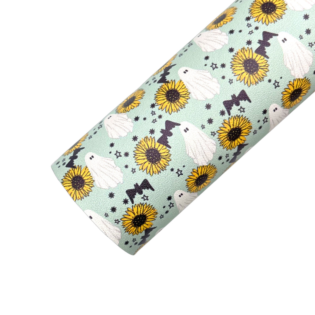 Sunflower and ghost pattern with pale green background faux leather sheet.