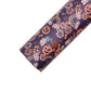 Golden June black and pale orange pumpkin and rainbow floral pattern faux leather sheet.