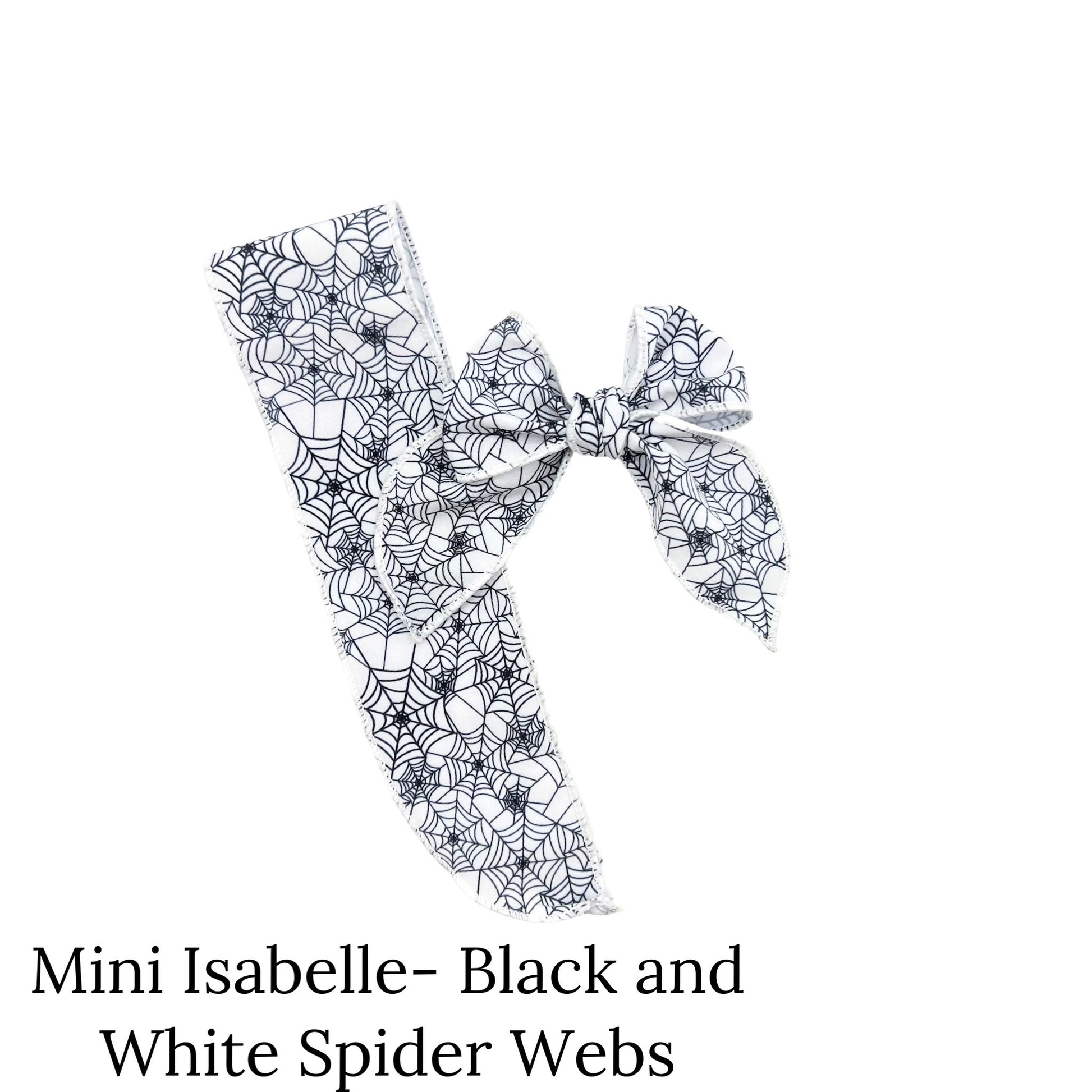 Small finished untied white bow strip with blackand white spider webs