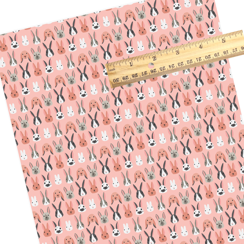 Cute Easter Bunnies on pink pattern faux leather sheets.