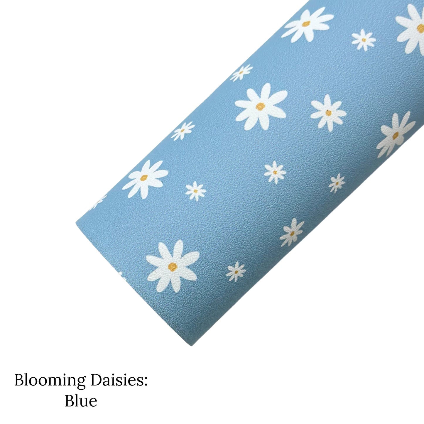 Rolled powder blue faux leather sheet with white and yellow daisy pattern.