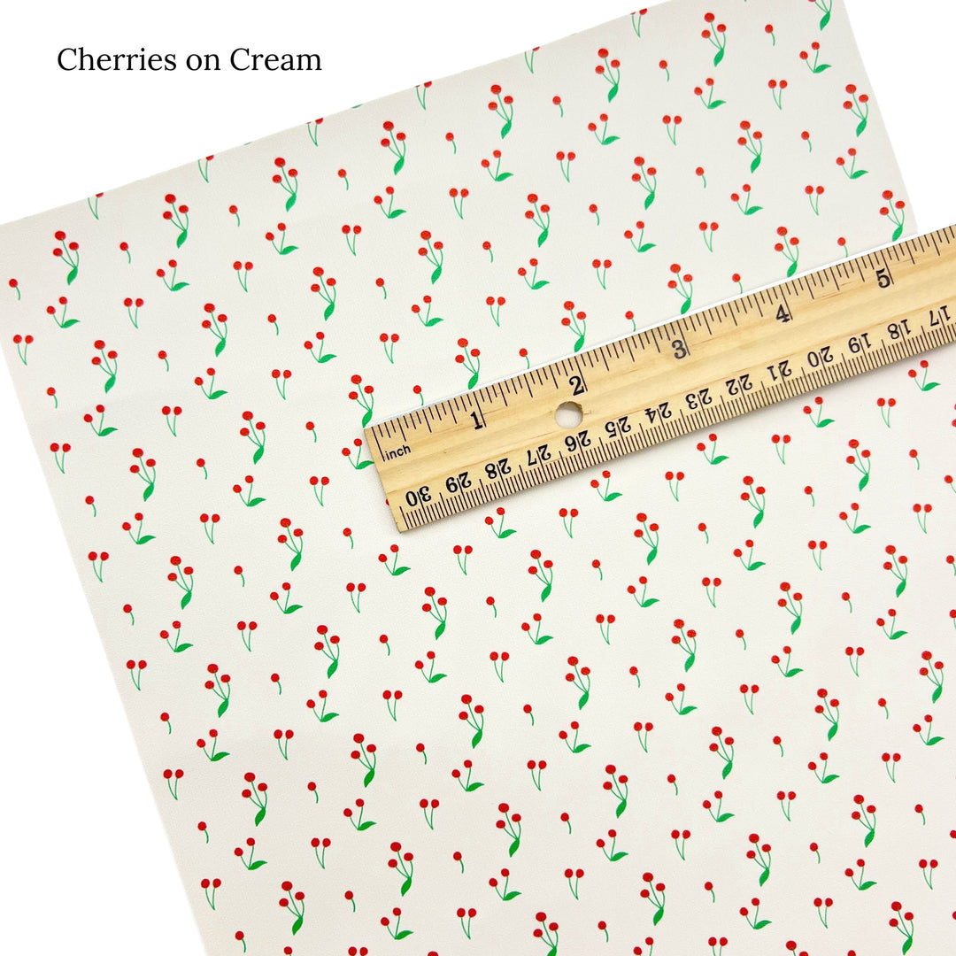 Summer fruits on cream faux leather sheet.