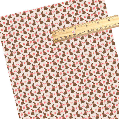 Adorable floral pattern with chocolate Easter bunnies faux leather sheet.