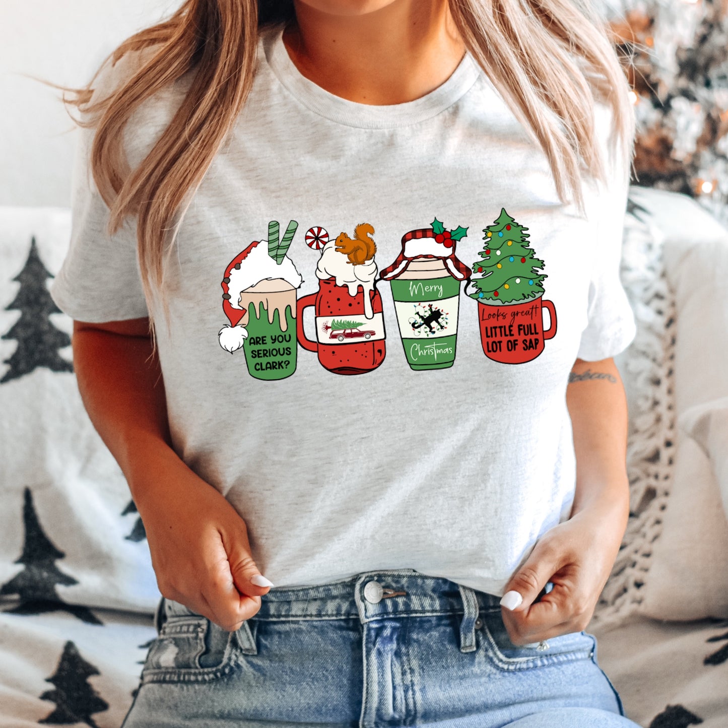 Green and red Christmas Coffee Cups with Christmas movie quotes