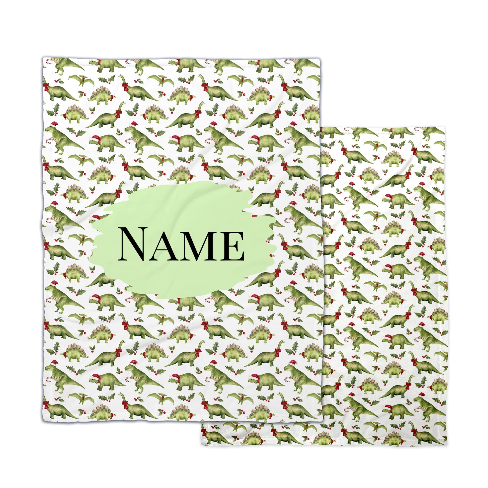 Cate & Rainn dinosaur Christmas patterned fleece blankets with customizable name.