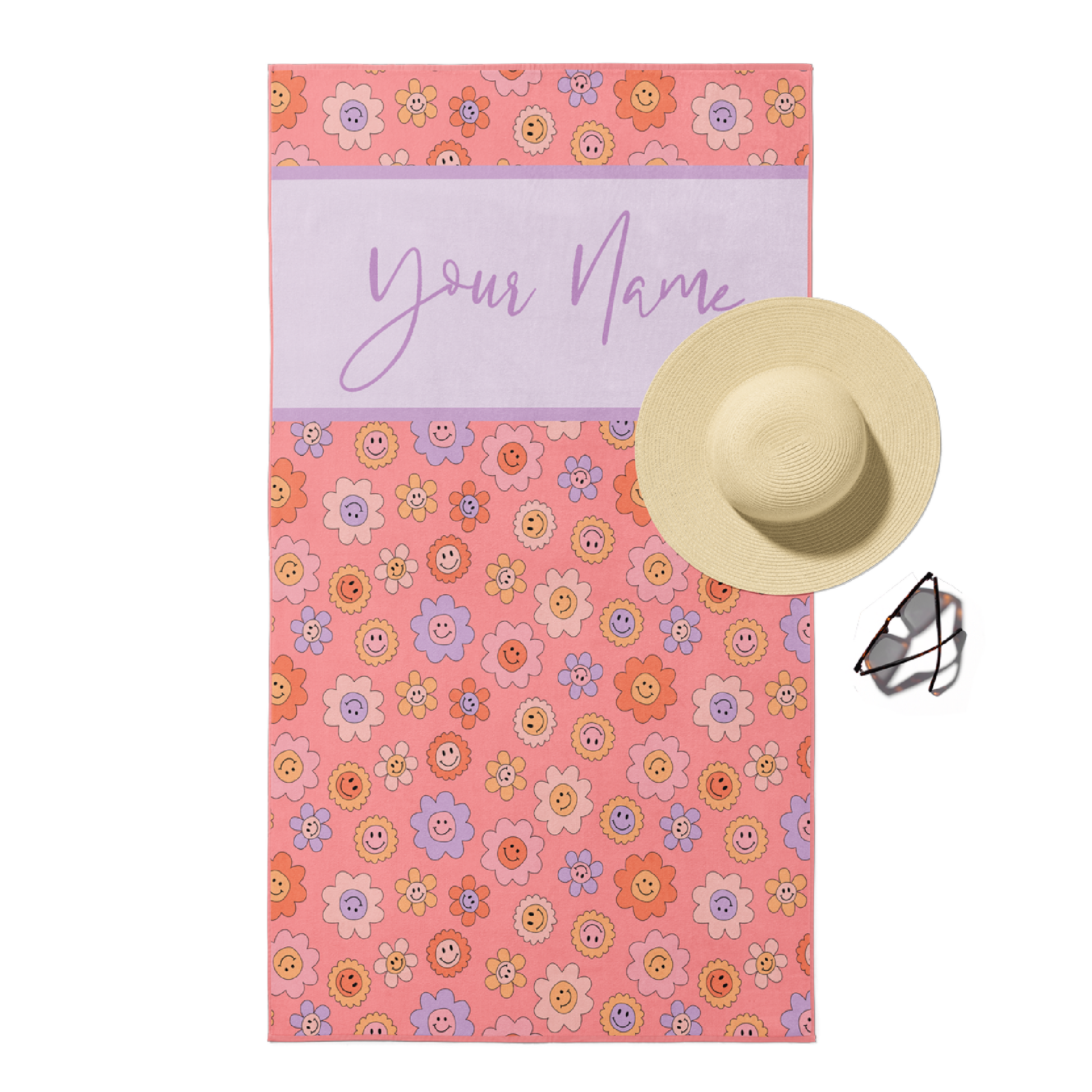 Beach towel in pink happy floral print with custom purple text.