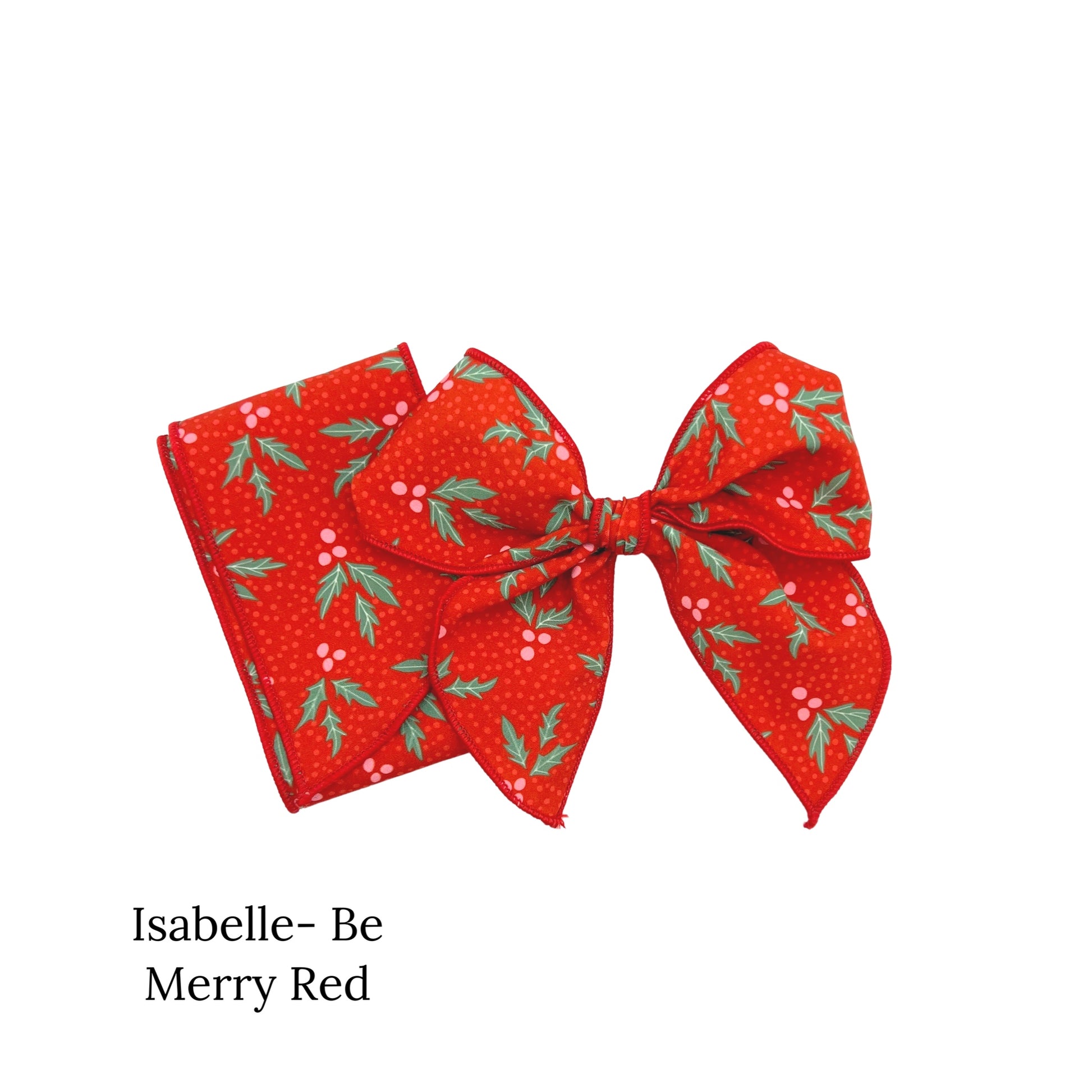 Red christmas bows with red berries and leaves