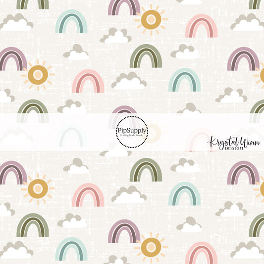 Cream fabric by the yard with clouds, rainbows, and designs