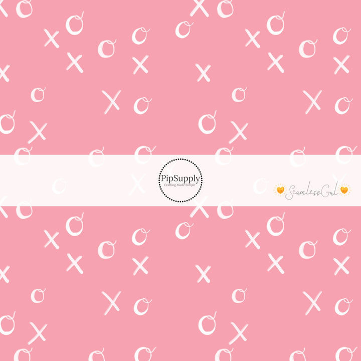 White writing XOXO on pink bow strips