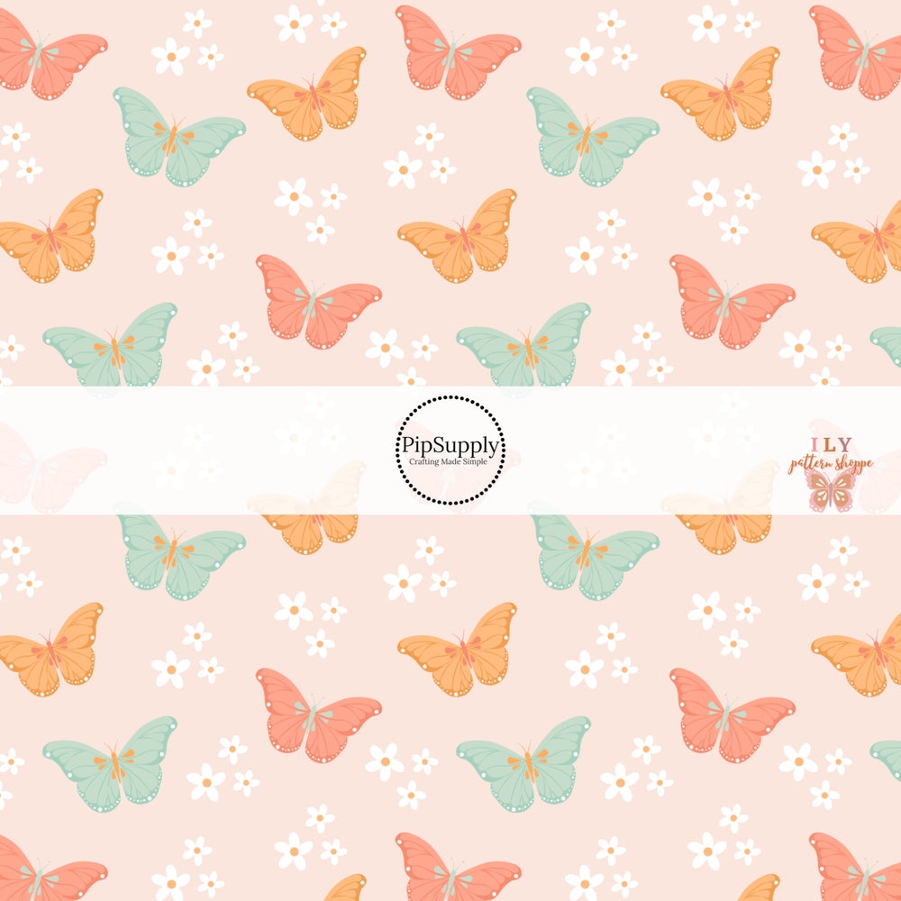 Aqua, pink, and orange butterflies on floral pink bow strips