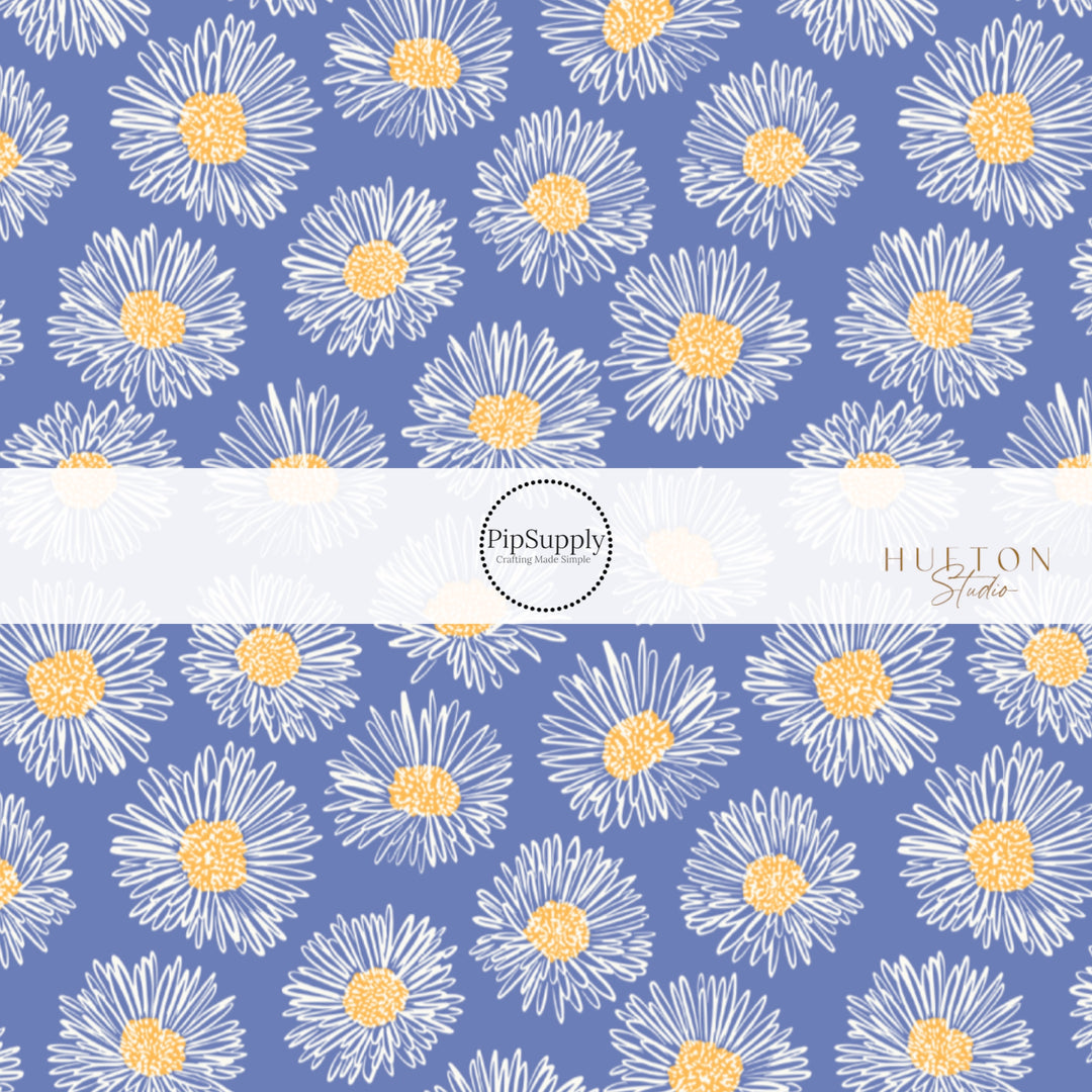 White daisy petals on blue with yellow center