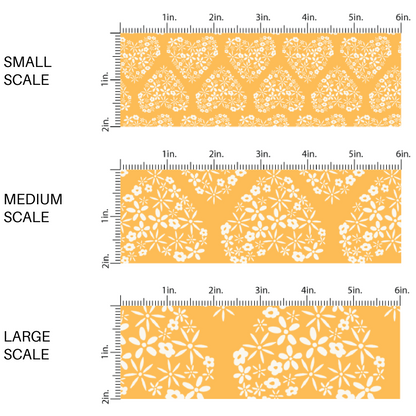 Yellow fabric scaling guide with white daisies in the shape of hearts