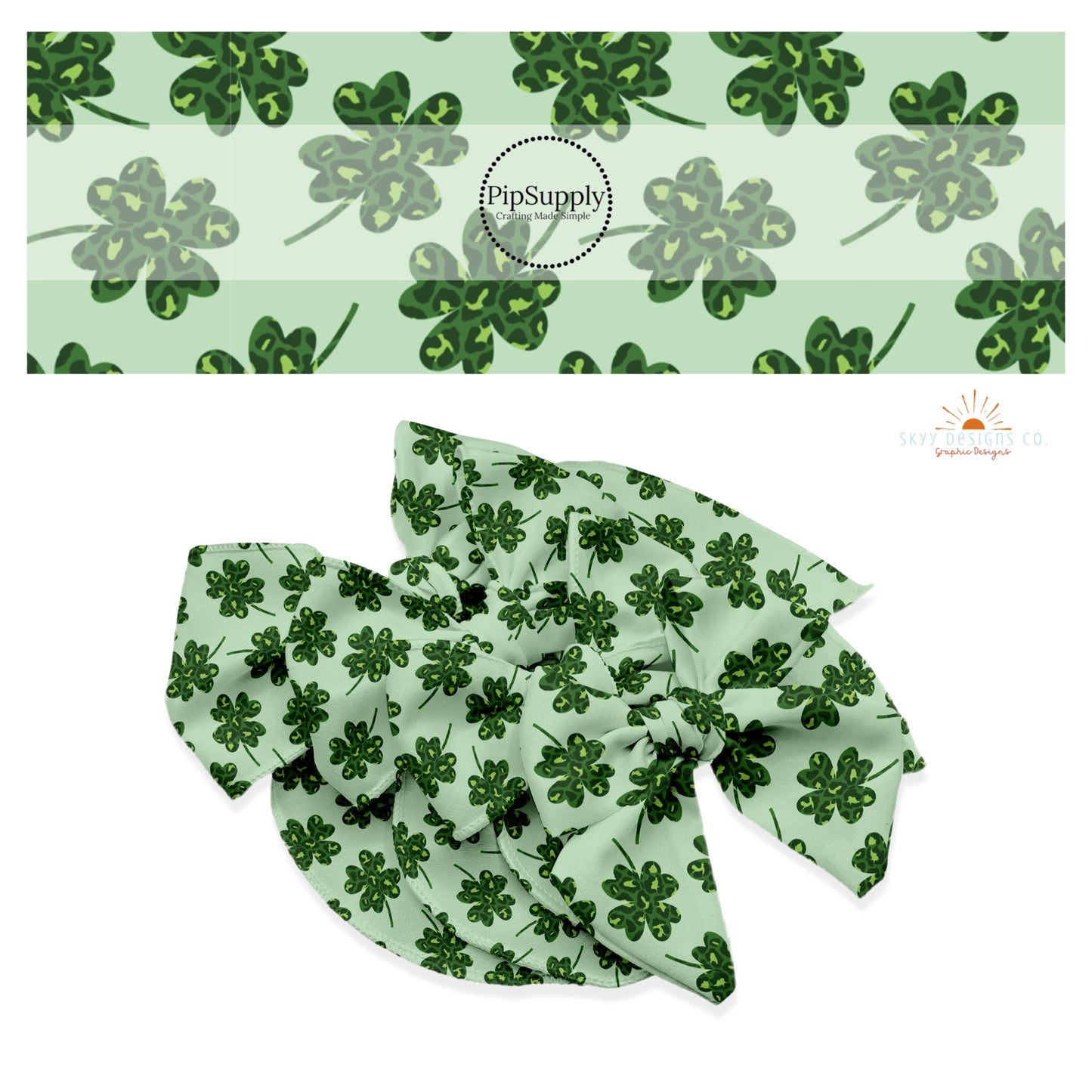 4 leaf clovers that have dark green and light green leopard spots on a light green bow strip