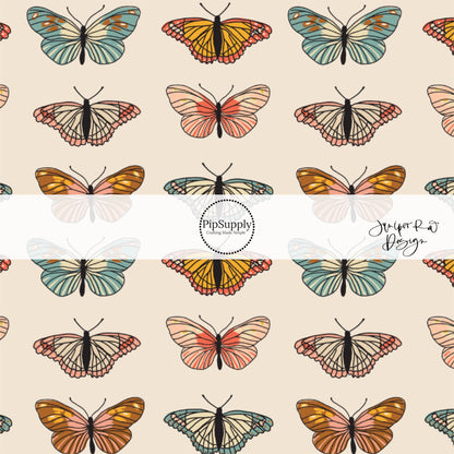 Multi blue, pink, orange, and brown butterflies on cream bow strips