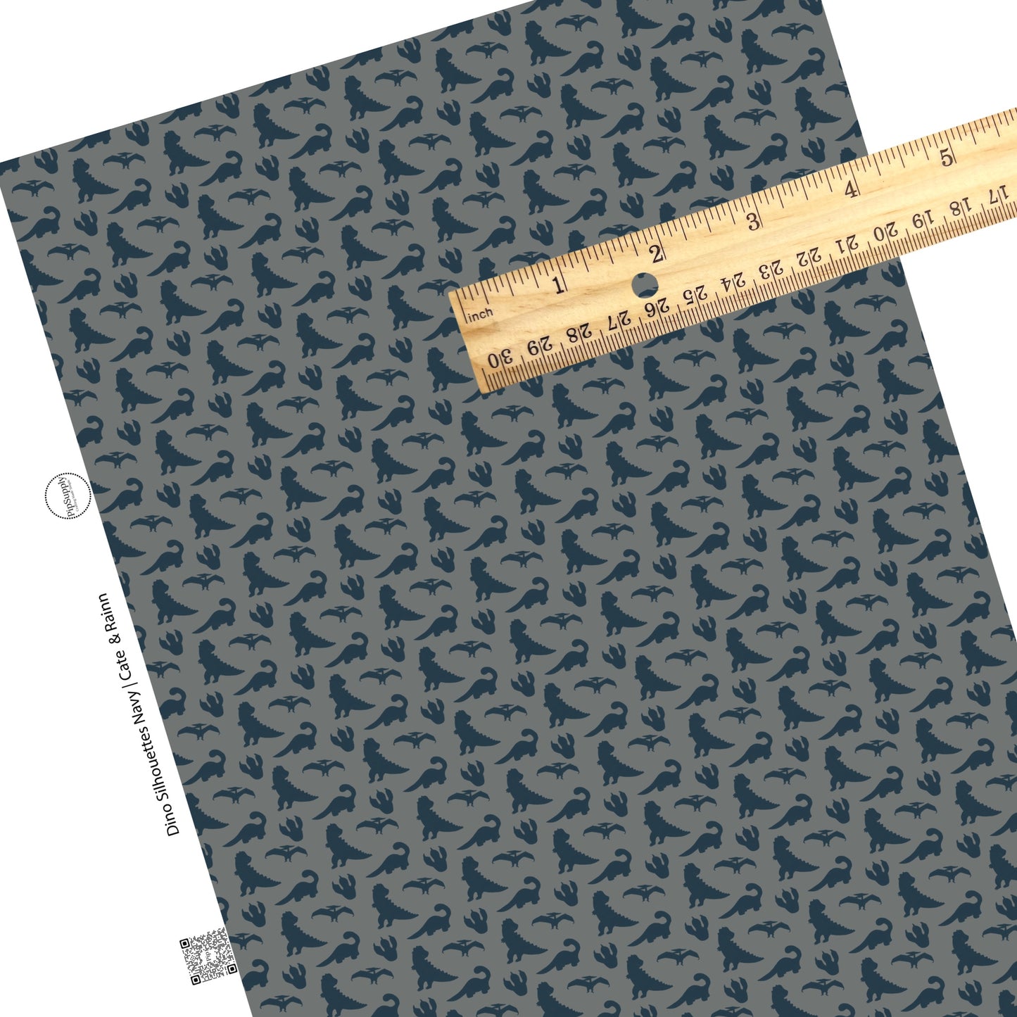 Navy blue dinos on grey faux leather sheet.