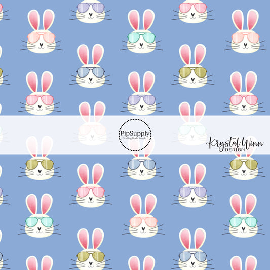 White bunny rabbits wearing sunglasses on blue fabric by the yard scaled image guide - Easter Bunny Fabric 