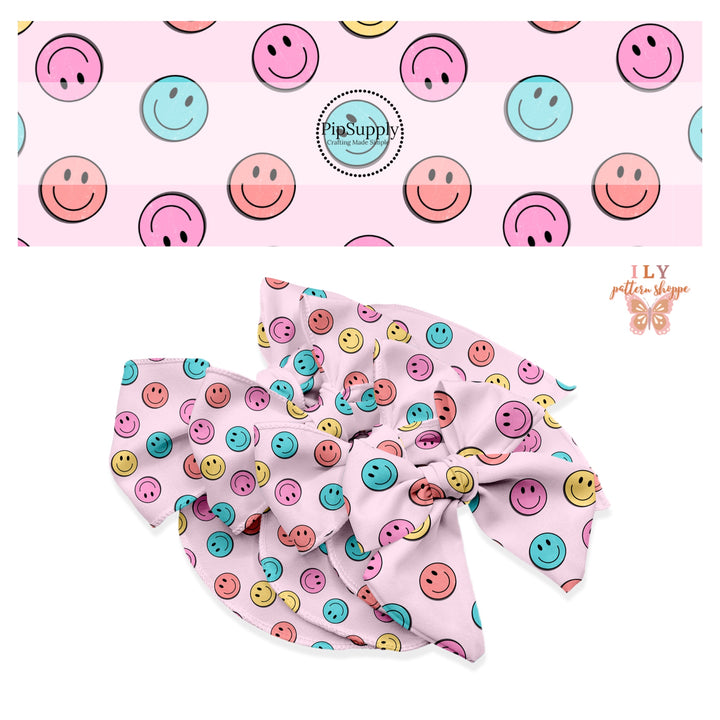 Pink and blue smiley faces on pink bow strips