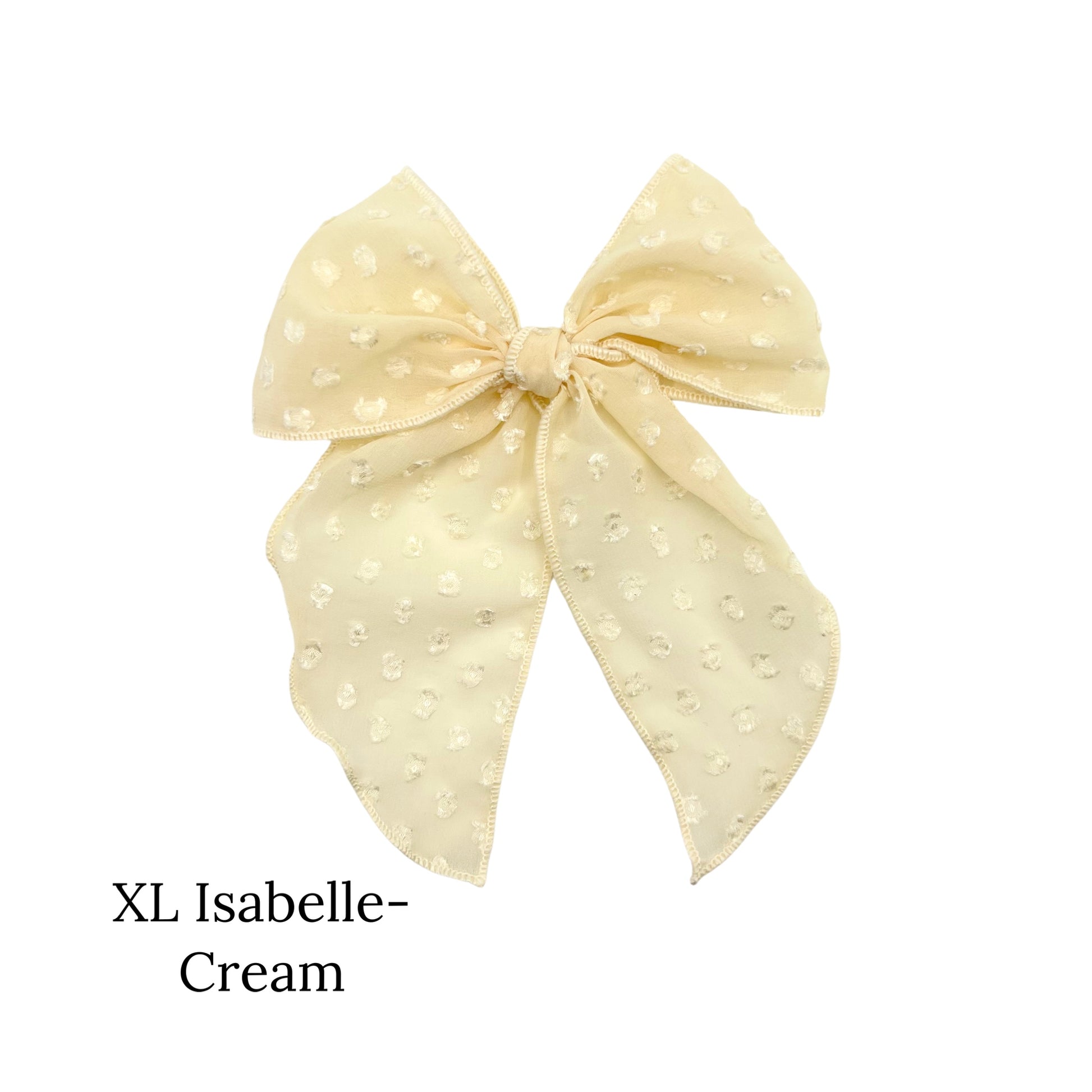 Large sized cream colored bow with frayed dots on a white background