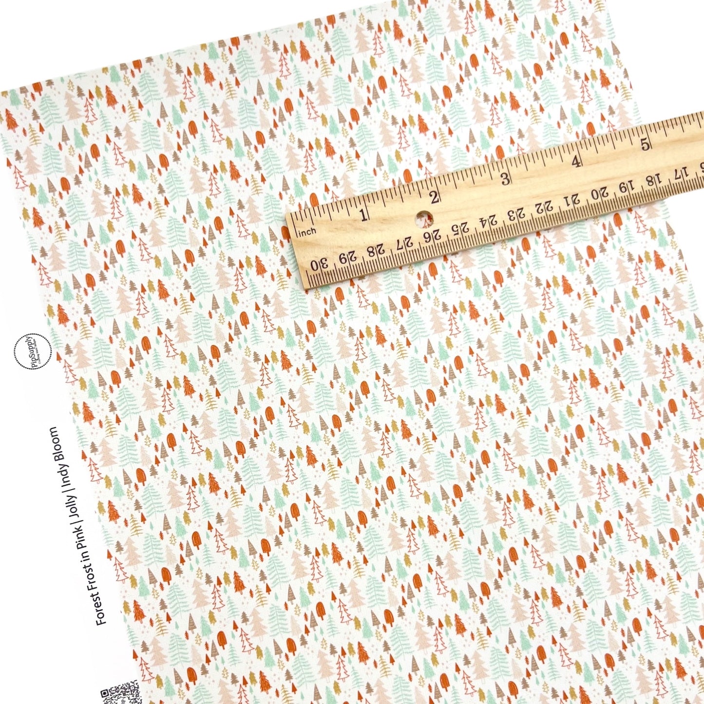 Rolled or individual christmas faux leather sheet with pink and blue trees on white background