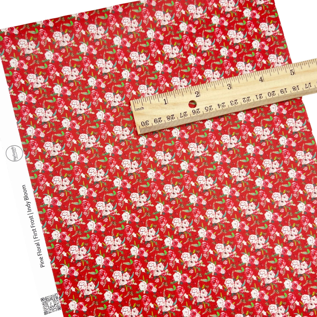 Rolled or individual christmas faux leather sheet with floral designs on a red background