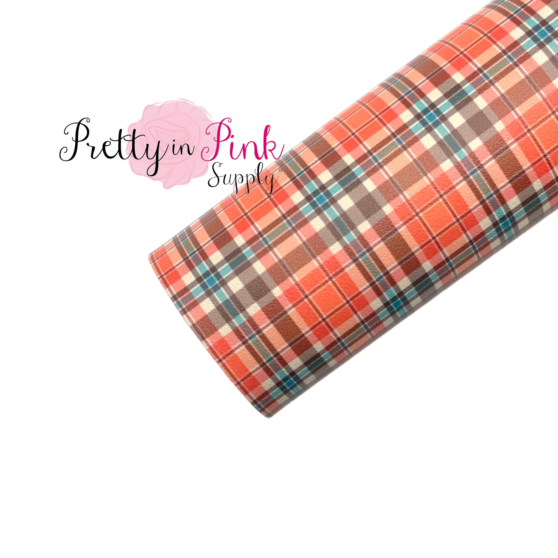 Rolled smooth faux leather sheet with autumn orange, brown, and teal plaid pattern.