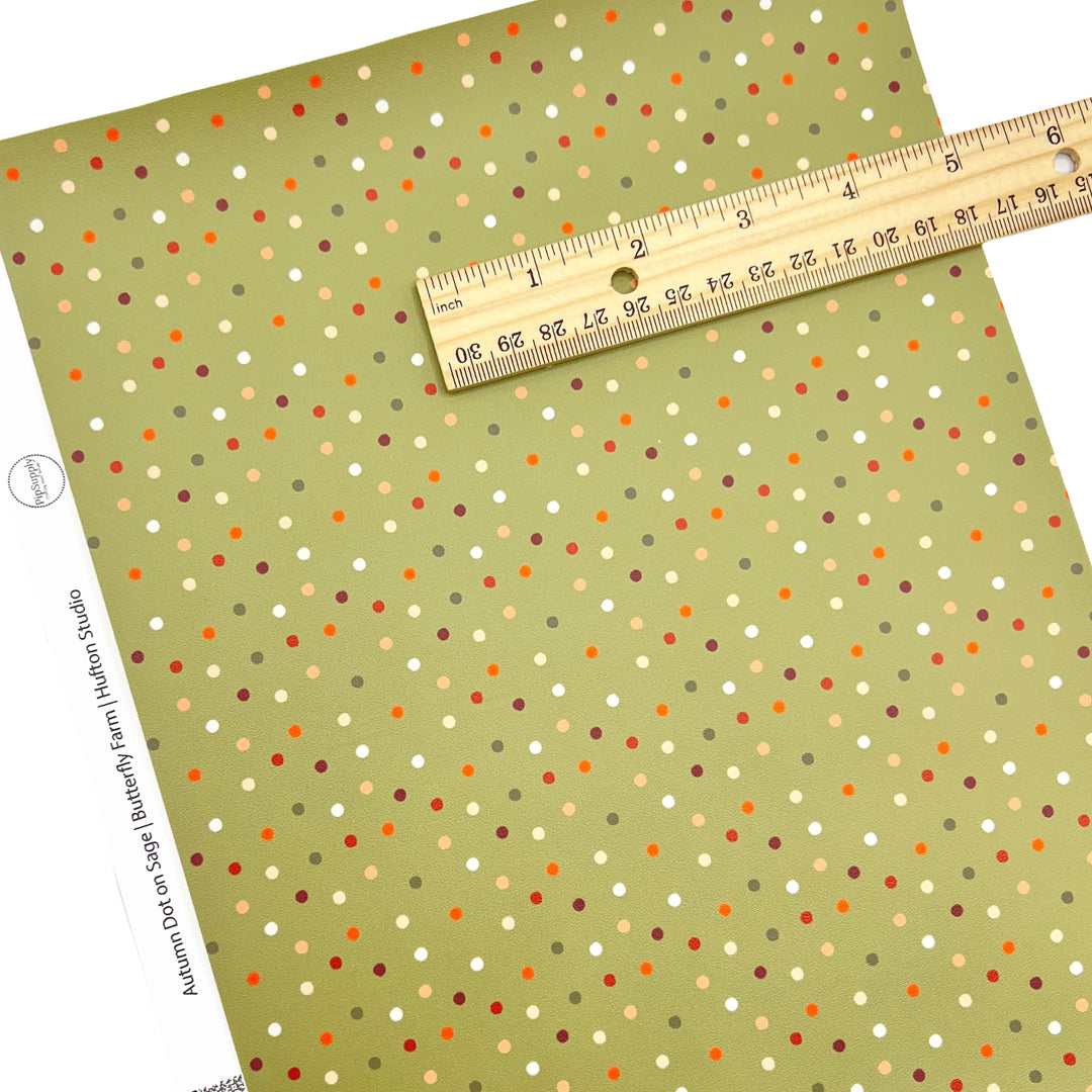 Green Faux leather sheet with neutral colored dots