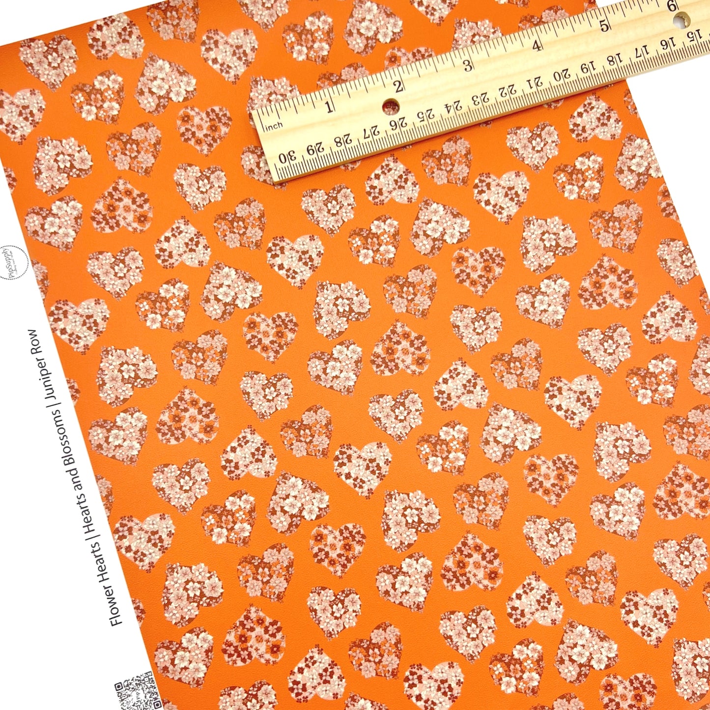 Orange faux leather sheet with flower hearts