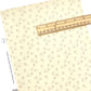 Cream colored faux leather sheet with christmas snowmen