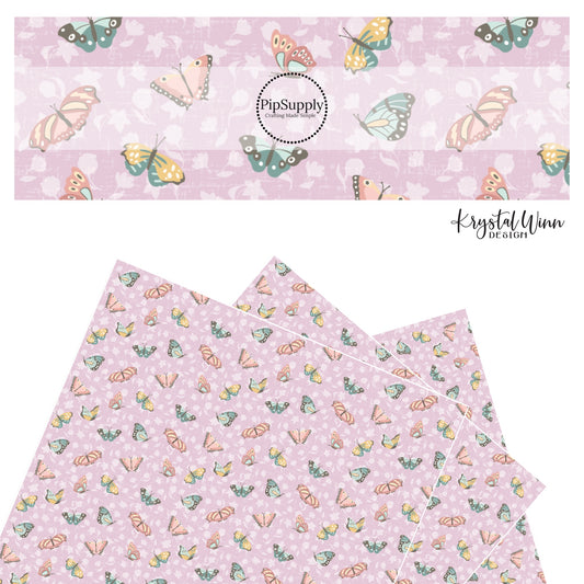 Pink, blue, and yellow butterflies with pale lavender flowers on a lavender faux leather sheets