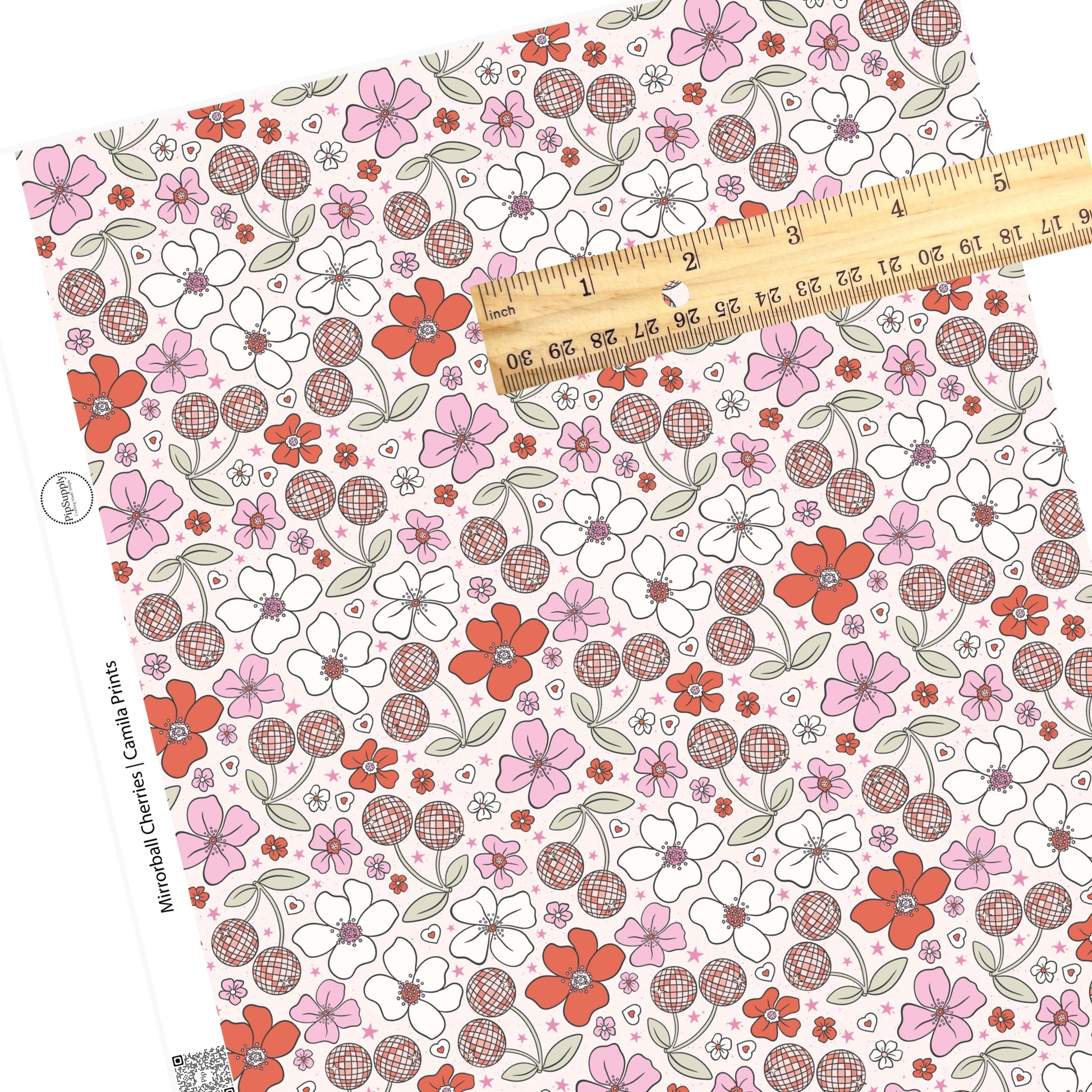Flowers with pink stars and disco cherries on white faux leather sheets