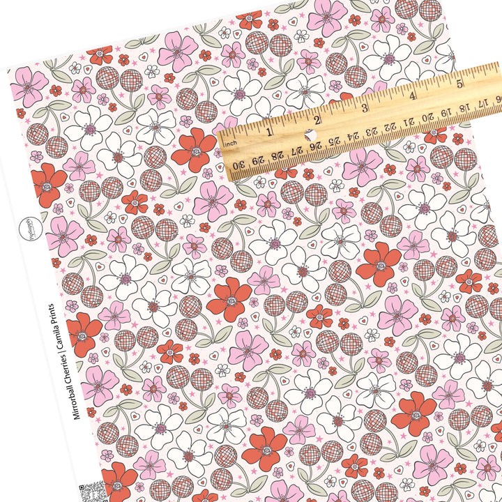 Flowers with pink stars and disco cherries on white faux leather sheets