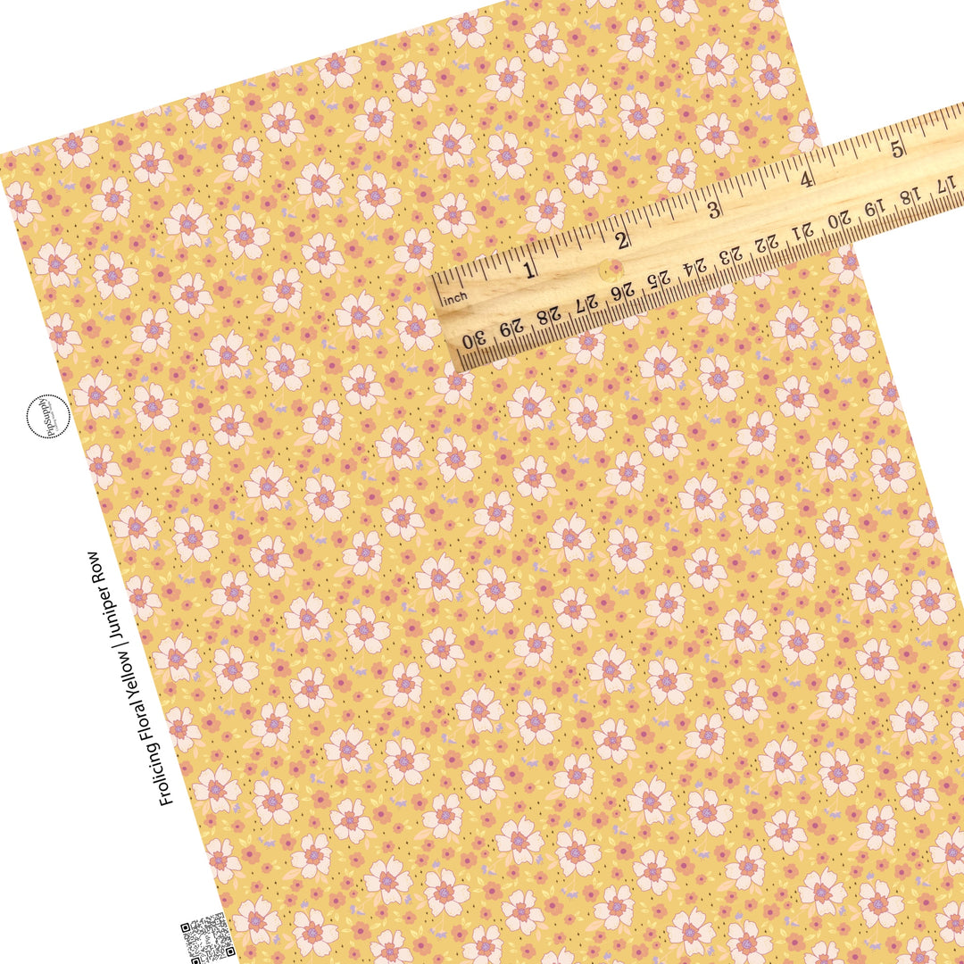 Tiny pink flowers with big light pink flowers on yellow faux leather sheets