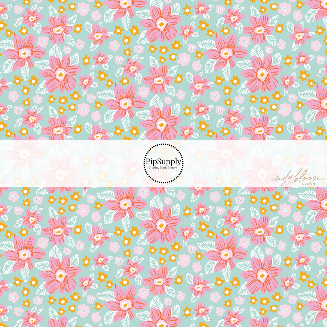 Pink and white floral print on aqua blue fabric by the yard