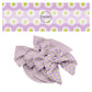 White flowers on purple bow strips