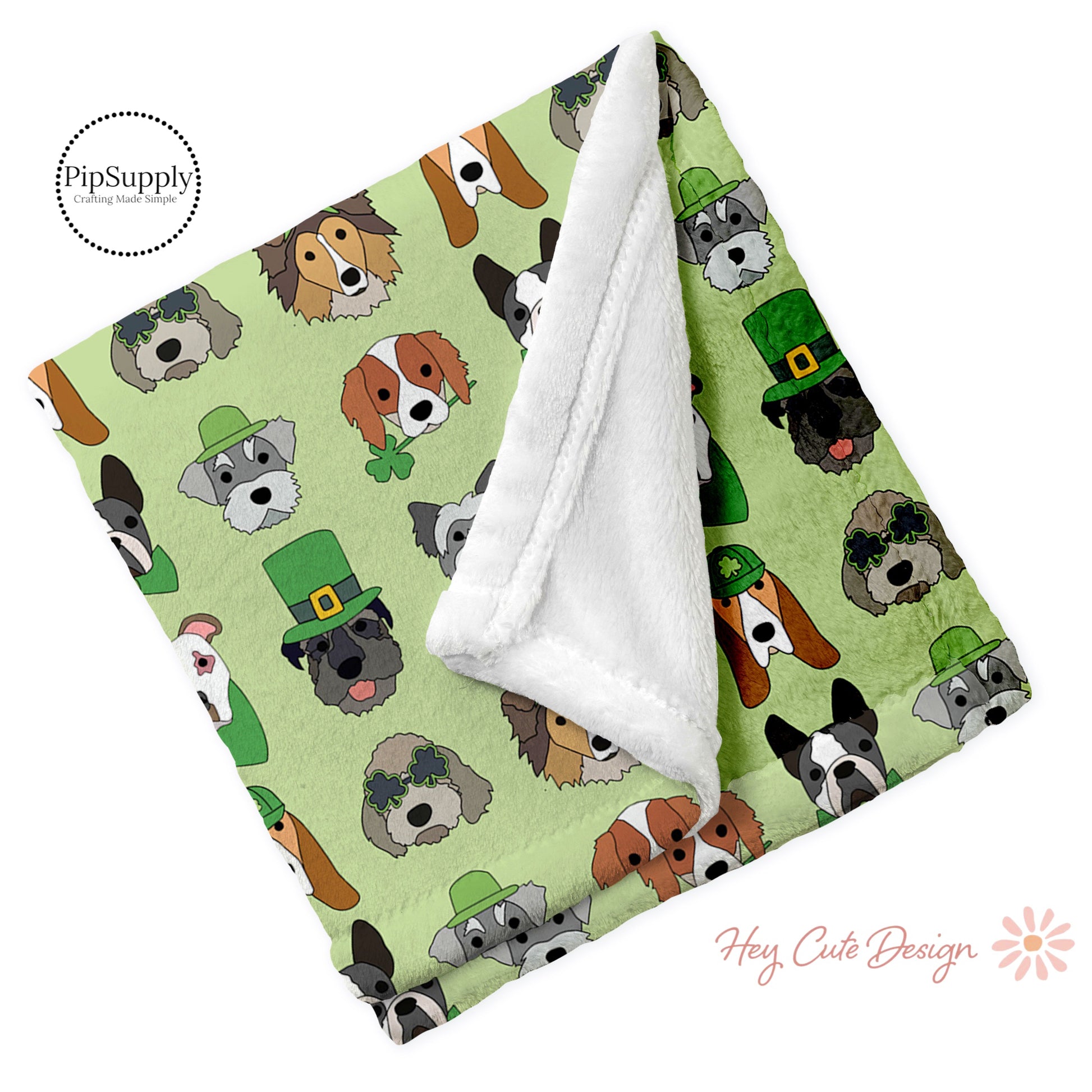 Soft folded minky fur blanket in light green St patricks Day dog pattern.