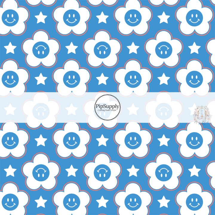 Red, white, and blue smiley face daisies and stars on blue fabric by the yard