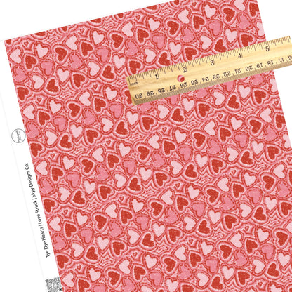 Valentine red and pink hearts on pink faux leather sheets