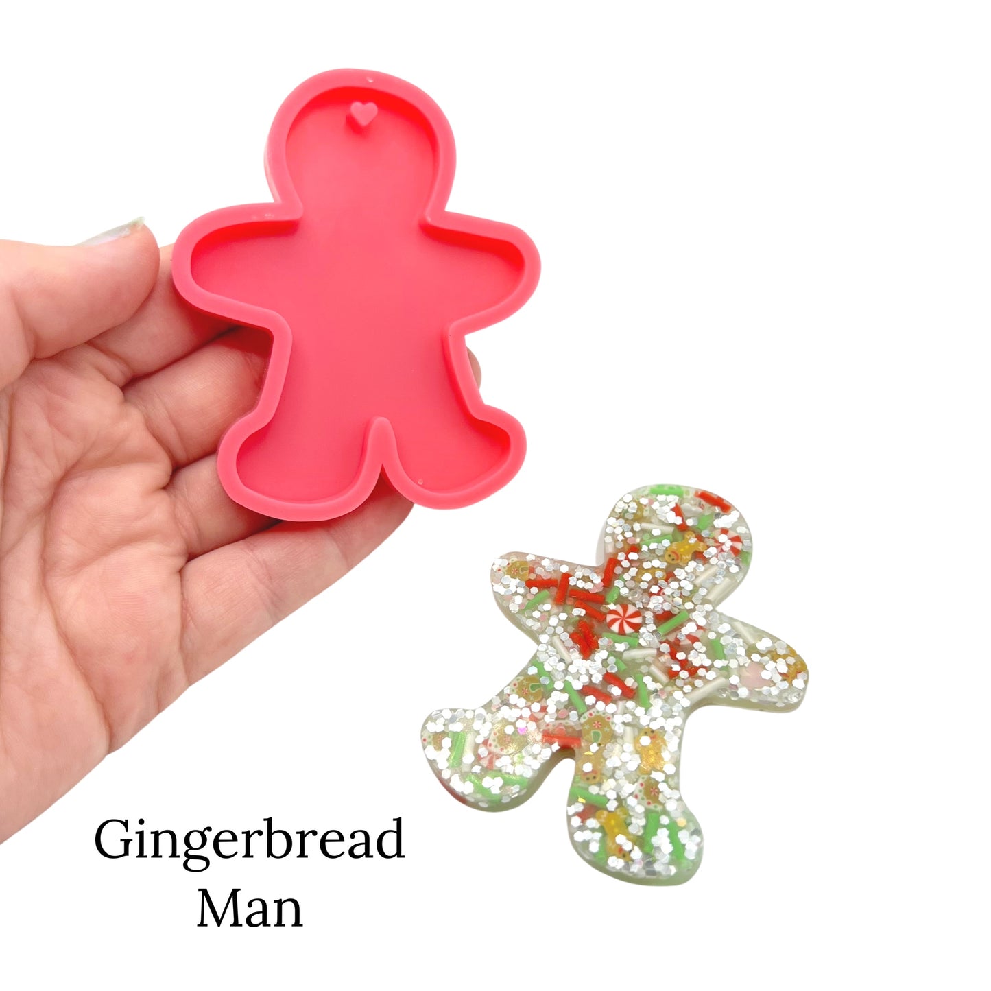 Sparkly gingerbread molds on a white background