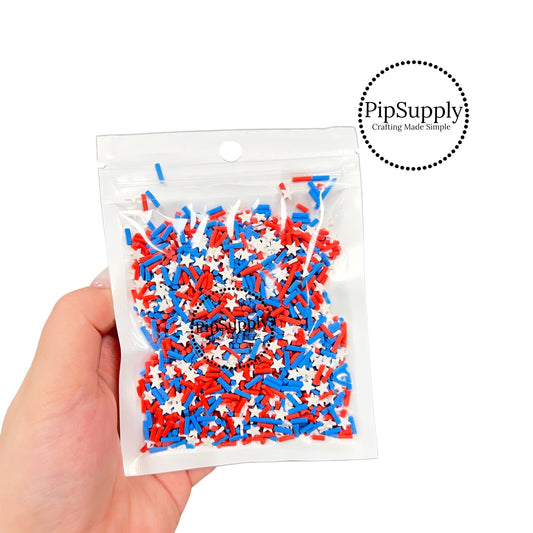Red, white, blue sprinkles with white star loose clays.