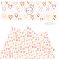 Outlined light pink, hot pink, and gold hearts on cream faux leather sheets