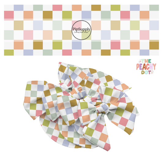 Olive green, light green, blue, and pink tiles on a white checker bow strip