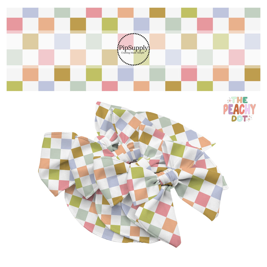 Olive green, light green, blue, and pink tiles on a white checker bow strip