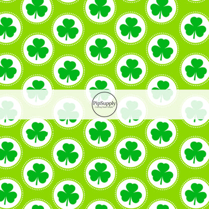 Polka dot white circles with emerald clovers on a bright green bow strip