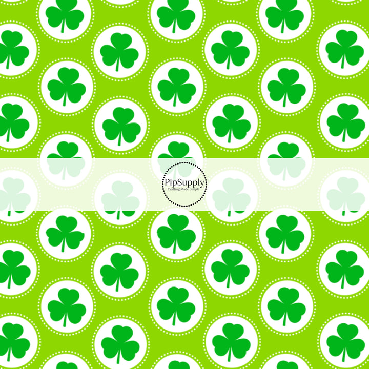 Polka dot white circles with emerald clovers on a bright green bow strip